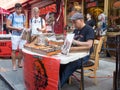 Man preparing handmade cigars at Little Italy, New York City Royalty Free Stock Photo