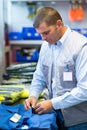 Man preparing order work overalls