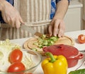 Man preparing salad in kitchen