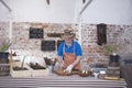 Man Preparing Speciality Sausages In Shop