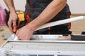 Man preparing to install new air conditioner. Modern air conditioner during the installation process Royalty Free Stock Photo