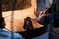 Man preparing Turkish coffee in traditional brass pots Royalty Free Stock Photo