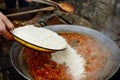 Man preparing a typical spanish paella