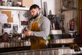 Man preparing welding machine for work Royalty Free Stock Photo