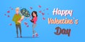 Man present woman bouquet of flowers happy valentines day holiday celebration concept young couple in love over pink