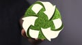 Man presenting 3D rendered recycle icon above his palm, eco friendly and sustainability concept