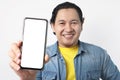 Man Presenting Smart Phone Mock Up Royalty Free Stock Photo
