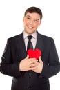 Man presents heart in Valentine day Royalty Free Stock Photo