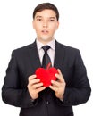 Man presents heart in Valentine day Royalty Free Stock Photo