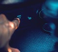 Man pressing 4WD lock button on a modern SUV Royalty Free Stock Photo