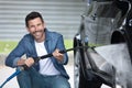 man pressure washing car Royalty Free Stock Photo