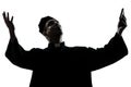 Man priest praying silhouette Royalty Free Stock Photo