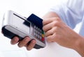 Man processing credit card transaction with POS terminal Royalty Free Stock Photo