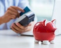 Man processing credit card transaction with POS terminal Royalty Free Stock Photo