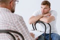 Man and professional counselor during psychotherapy for people with ptsd