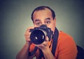 Man with professional dslr camera Royalty Free Stock Photo