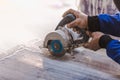 Man professional worker cutting tile Royalty Free Stock Photo