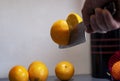 A man professionally cuts a orange Royalty Free Stock Photo
