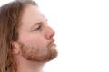 Man in profile is looking scaptical Royalty Free Stock Photo