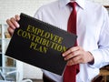 Man proposes Employee Contribution Plan for reading.