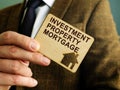 Man proposes Investment property mortgage sign