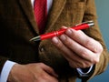 Man proposes pen. Write your story concept Royalty Free Stock Photo