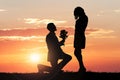 Man Proposing His Girlfriend At Sunset Royalty Free Stock Photo