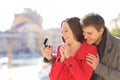 Man proposing marriage to his happy girlfriend Royalty Free Stock Photo