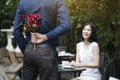 A man is proposing marriage to a smiling woman Royalty Free Stock Photo