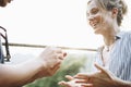 Man proposing to his happy girlfriend outdoors love and marriage concept Royalty Free Stock Photo