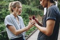 Man proposing to his happy girlfriend outdoors love and marriage concept Royalty Free Stock Photo