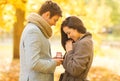 Man proposing to a woman in the autumn park Royalty Free Stock Photo