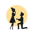 Man proposing to a woman kneeling, romantic couple silhouette