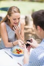 Man proposing to woman offering engagement ring Royalty Free Stock Photo