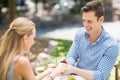 Man proposing to woman offering engagement ring Royalty Free Stock Photo