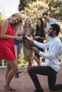 Man proposing woman in balcony Royalty Free Stock Photo