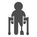 Man with prosthetic leg and crutches solid icon, disability concept, disabled person without leg sign on white Royalty Free Stock Photo