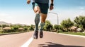 Man with prosthetic leg are running at park city, Fit young man with physical disability doing rehabilitation exercise routine