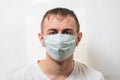 Man in protection mask. Doctor in surgical mask on white background. Protection from germs
