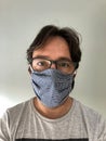 Man with protective mask made of checkered fabric Royalty Free Stock Photo