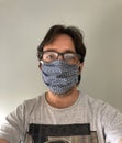 Man with protective mask made of checkered fabric Royalty Free Stock Photo