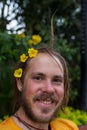 Man pruning flowers and gardening