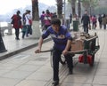 Man pulled dray in gulangyu, china Royalty Free Stock Photo