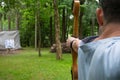 Man, pulled the string, for a further shot from the bow to the target Royalty Free Stock Photo