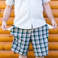 Man pulling out empty pockets Royalty Free Stock Photo