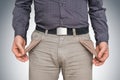 Man pulling out empty pockets - poor people concept Royalty Free Stock Photo