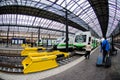 Man pulling trolleys at Helsinki Central Trainstation, Finland