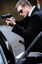 Man pulls a gun in car Royalty Free Stock Photo