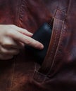 Man pulls out a wallet from another's pocket Royalty Free Stock Photo