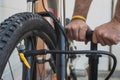 Man pumping a bicycle tire Royalty Free Stock Photo